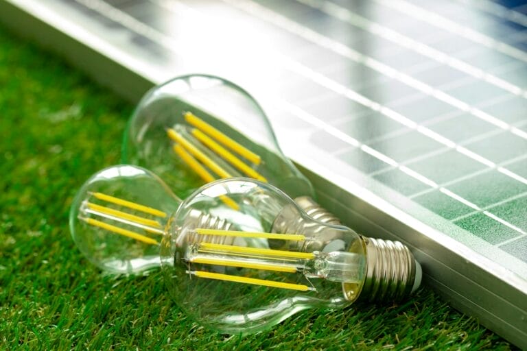 Solar energy panel and light bulb, green energy