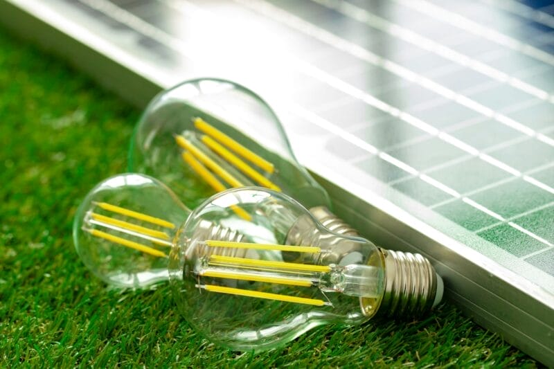 Solar energy panel and light bulb, green energy